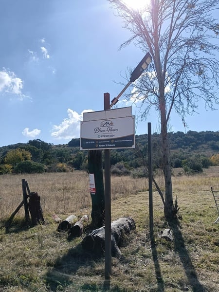 Business Board by the property entrance