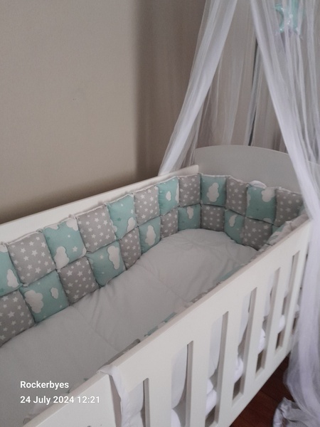 Stuffed cot bumper