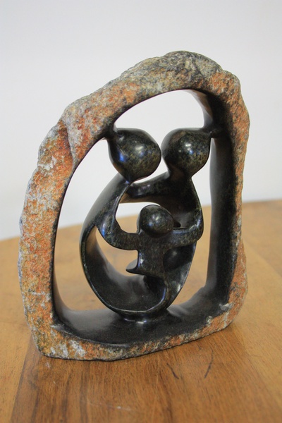 Stone curved African family