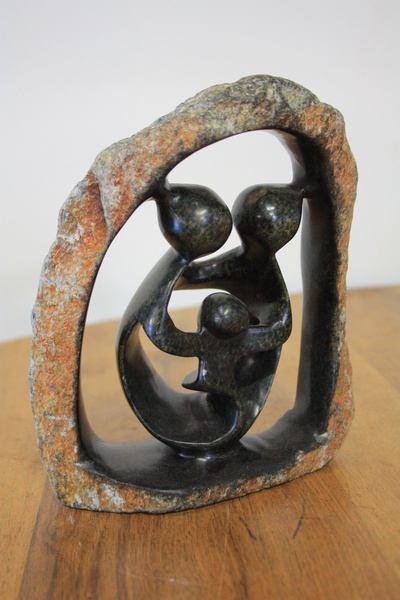 Stone curved African family