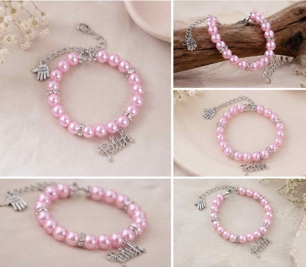 Handmade pink glass bead bracelets with silver Faith charm, crystal spacer beads and adjustable clasp on a soft neutral background.