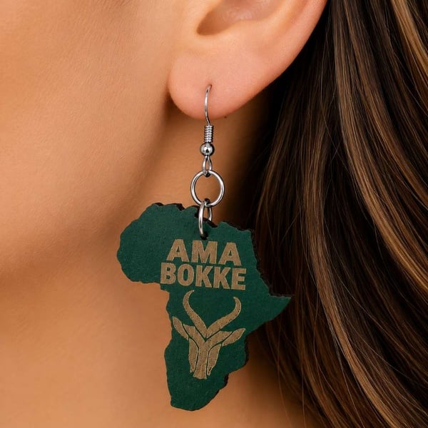 Show your Bokke pride with handmade AMA BOKKE Africa wooden dangle earrings. Lightweight with silver hooks, perfect for rugby fans and gifts.
