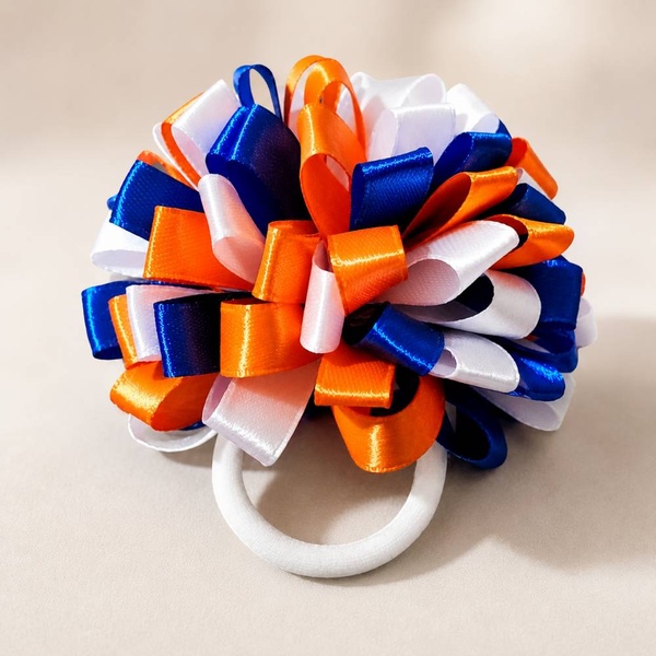 Orange, royal blue and white looped ribbon hair bow on a white elastic, handmade for school, sports and everyday hairstyles.