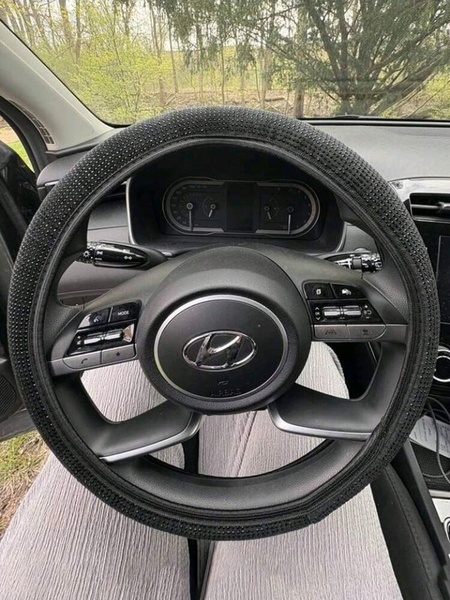 Steering wheel cover and car seat back hooks