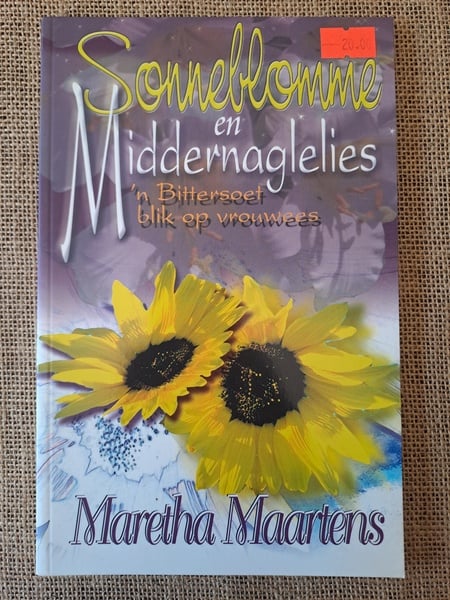 Sonneblomme en Middernaglelies