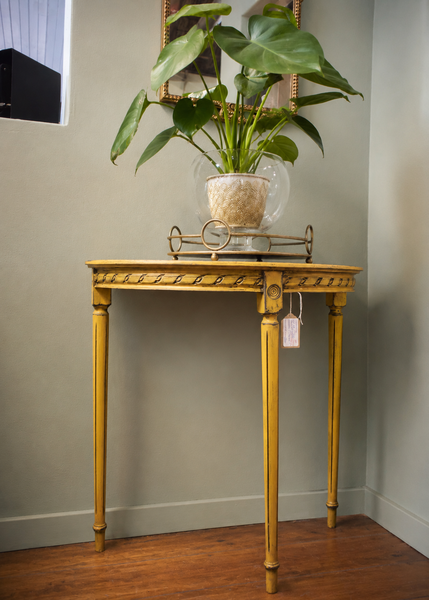 Yellow half moon table