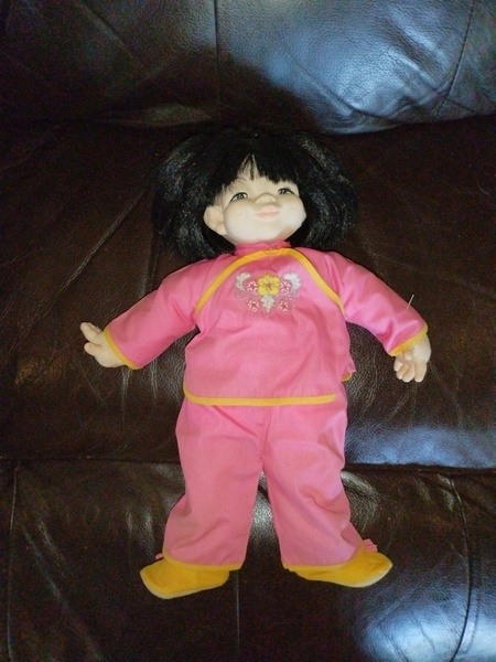 Asian British Iris Kwok Collectible Doll.